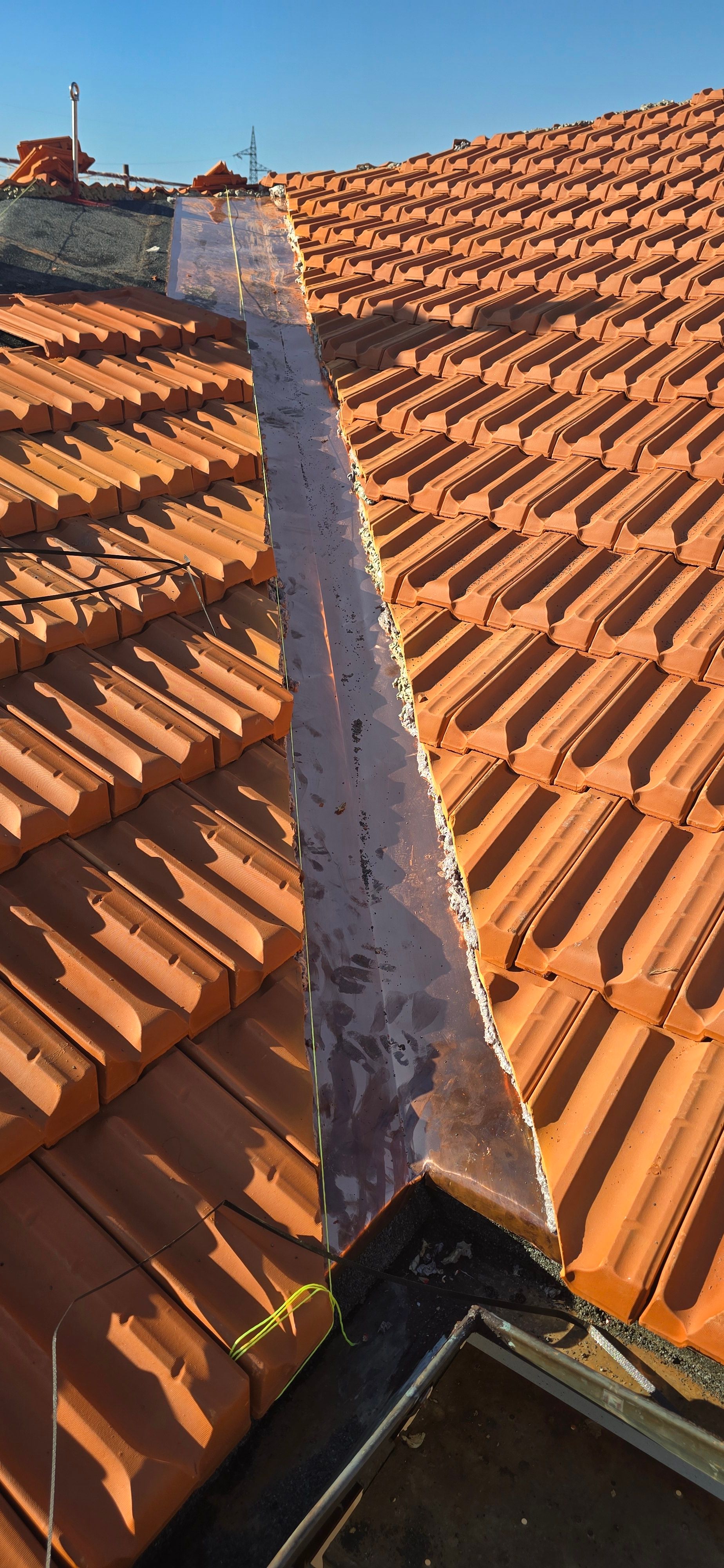 Posa manto di copertura in tegole marsigliesi